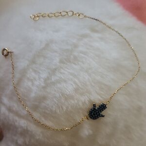 Elegant Gold and Black Hamsa Bracelet